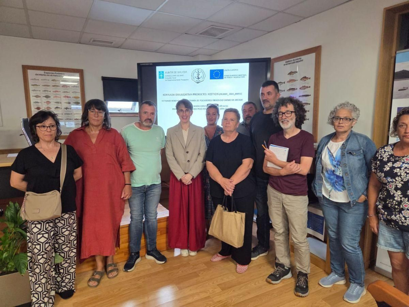 Algunos de los asistentes a las jornadas con la directora de Desenvolvimento Pesqueiro.